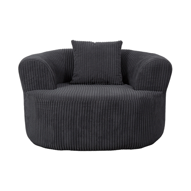 Jednoduchá celopenová pohovka z tmavosivého manšestru so zodpovedajúcimi vankúšmi Jednoduchá celopenová pohovka z tmavosivého manšestru so zodpovedajúcimi vankúšmi